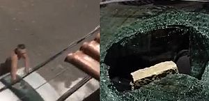 Vídeos: homem descontrolado quebra vidro de carro com paralelepípedo e foge em Cruz das Almas